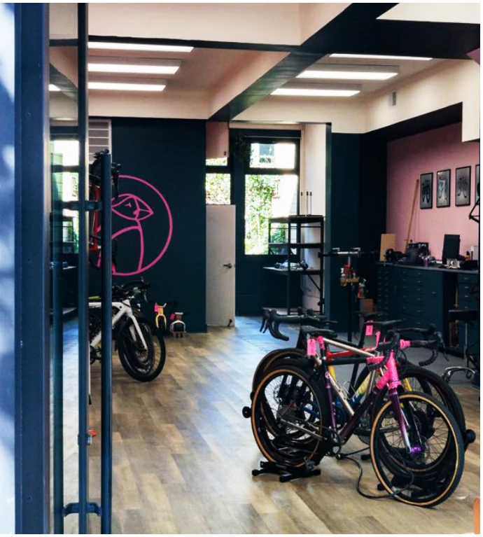 Bicycle shop interior photo, as printed